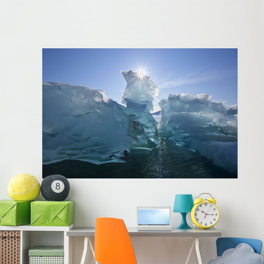 An Iceberg Floating On The Calm Waters Of Holkham Bay Wall Mural
