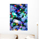 Close Up Of A Multi-Colored Christmas Tree Lit At Dusk Outside Wall Mural