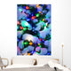 Close Up Of A Multi-Colored Christmas Tree Lit At Dusk Outside Wall Mural