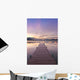 Footprints Leading Down A Frost Coverd Dock At Sunrise Wall Mural
