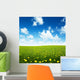 field of spring flowers and perfect sky Wall Mural
