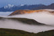 Fog Settles between Mountain Wall Decal