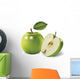 green apples and leaves on a white background Wall Mural