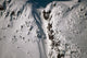 Person Snowboarding down Chute Wall Decal