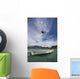 kiter's jump over a boat Wall Mural