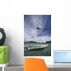 kiter's jump over a boat Wall Mural