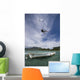 kiter's jump over a boat Wall Mural