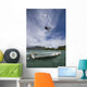 kiter's jump over a boat Wall Mural