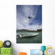 kiter's jump over a boat Wall Mural