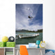 kiter's jump over a boat Wall Mural