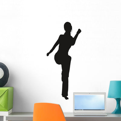 Silhouette Gymnast Wall Decal shown on a wall