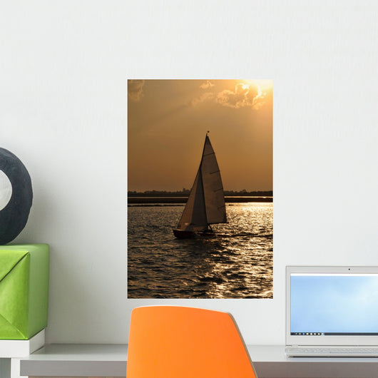 Silhouette of a Sailing Boat at Sunset Wall Mural