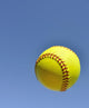 Yellow Softball in the Air Wall Mural