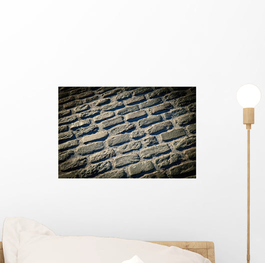 Pattern of stones on a street;Catalonia spain Wall Mural