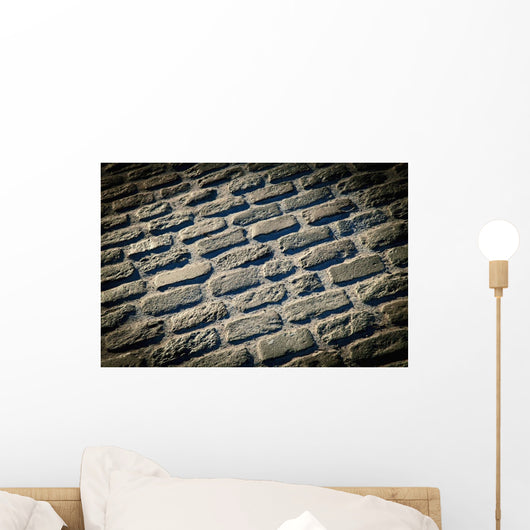 Pattern of stones on a street;Catalonia spain Wall Mural