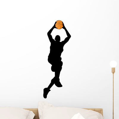 Basketball Player Silhouette shown on a wall