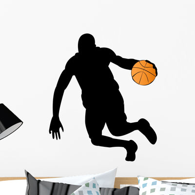 Basketball Player Silhouette Wall Decal shown on a wall