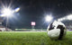 Soccer Ball in Stadium at Night Wall Mural