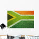 South African flag on football or rugby pitch Wall Mural