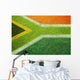 South African flag on football or rugby pitch Wall Mural