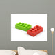 Plastic toy blocks on white background. Wall Decal