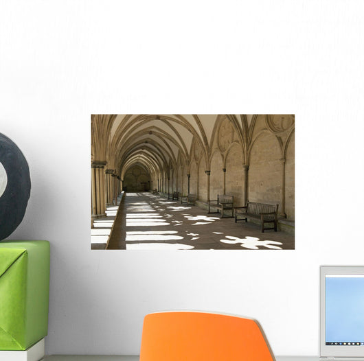 A covered corridor with benches and a dome ceiling;Salisbury england Wall Mural