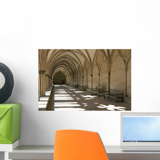 A covered corridor with benches and a dome ceiling;Salisbury england Wall Mural
