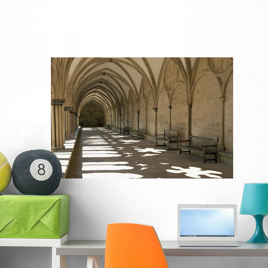 A covered corridor with benches and a dome ceiling;Salisbury england Wall Mural