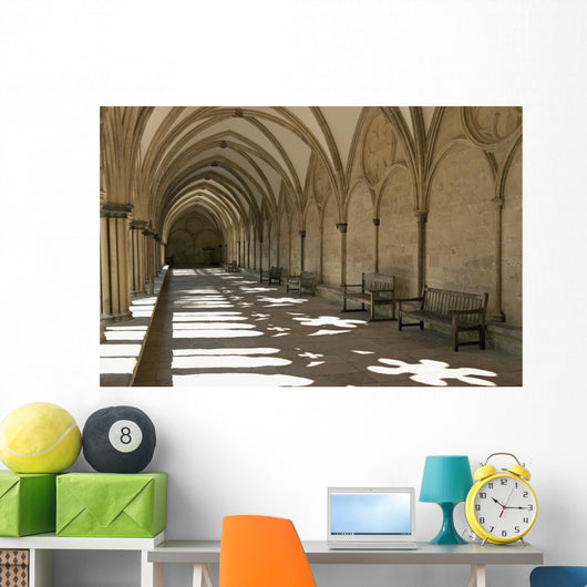 A covered corridor with benches and a dome ceiling;Salisbury england Wall Mural