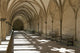 A covered corridor with benches and a dome ceiling;Salisbury england Wall Mural