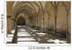 A covered corridor with benches and a dome ceiling;Salisbury england Wall Mural