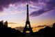 Eiffel Tower Against a coloful sunset Wall Mural