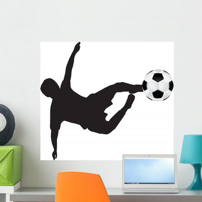 Football Silhouette Flying Kick shown on a wall