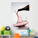 pouring red wine into decanter Wall Mural