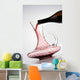 pouring red wine into decanter Wall Mural