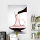 pouring red wine into decanter Wall Mural