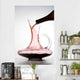 pouring red wine into decanter Wall Mural