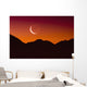Sunrise over a mountain range Wall Mural