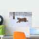 A female Lynx running Wall Mural