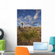 Yucca plants and joshua trees dot the landscape Wall Mural