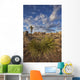 Yucca plants and joshua trees dot the landscape Wall Mural