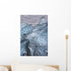 A close-up view of glacial ice strewn across a coastal beach Wall Mural