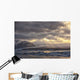 Shafts of sunlight shine on the ice calves floating Wall Mural