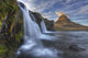 The mountain kirkjufell and waterfall kirkjufellsfoss Wall Mural