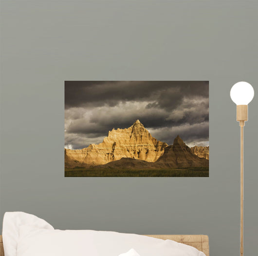 Dramatic light during a storm in badlands national park Wall Mural