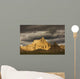 Dramatic light during a storm in badlands national park Wall Mural