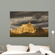 Dramatic light during a storm in badlands national park Wall Mural