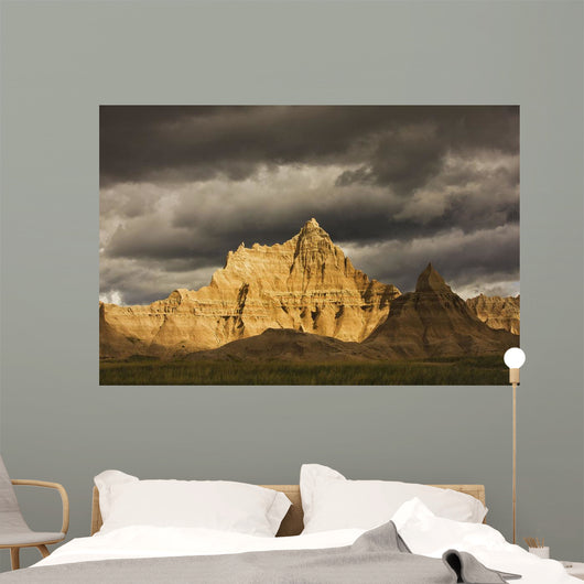 Dramatic light during a storm in badlands national park Wall Mural