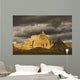 Dramatic light during a storm in badlands national park Wall Mural
