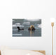 Sea Otter Swims On It's Back Amidst The Sea Ice Wall Mural